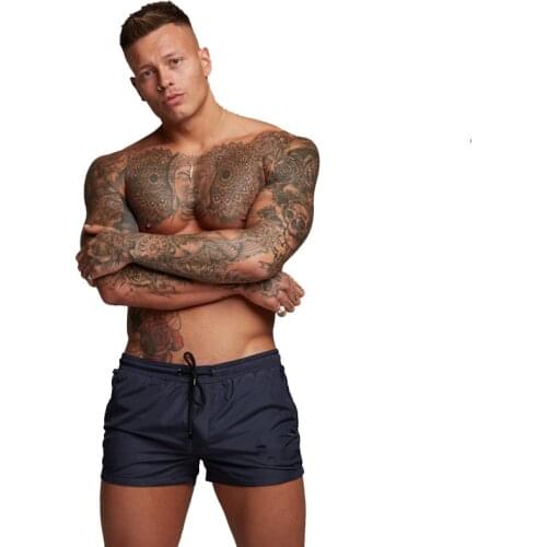Summer Sports Shorts New Mens Casual Pants Muscle Speed Running or Jogging Sports Beach Five-point Fitness Shorts 2021