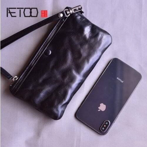AETOO Handmade vegetable tanned leather mens clutches, large-capacity leather ladies long wallets, card holders