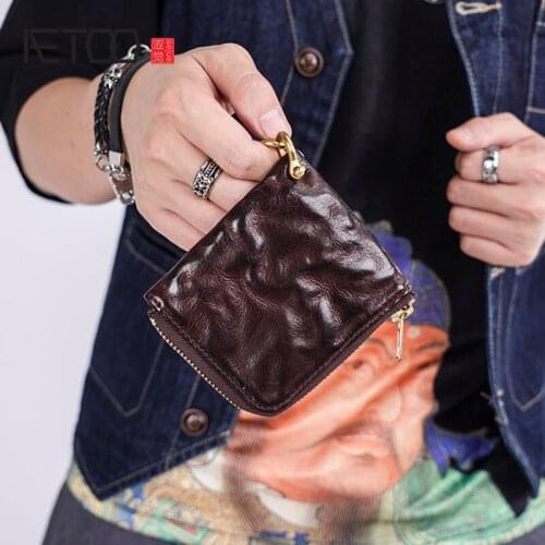 AETOO Simple retro wallet in vegetable tanned cowhide, small leather coin purse with hook buckle, card and coin storage bag