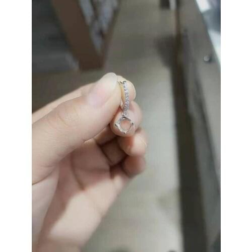 Only metal earrings not including topaz gem