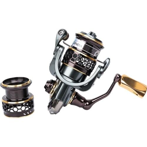Rock Fishing Reel 1000s Spinning Reel 5.2:1 10BB Trolling Wheels Wedkarstwo Vessel Molinete De Pesca Telescopic Angeln Reels