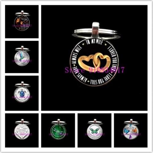 The new style for my daughter and mom and dad round glass keychain hummingbird butterfly pendant round glass keychain