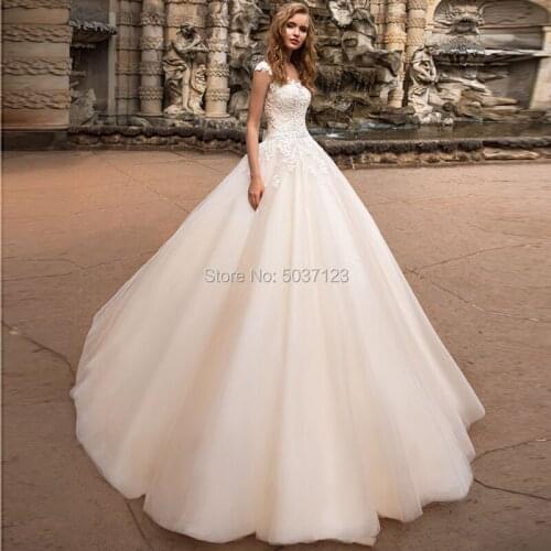 2020 Elegant Champagne Ball Gown Wedding Dresses Cap Sleeves Sleeveless Lace Appliques Vestido De Noiva Princess Robe De Mariee