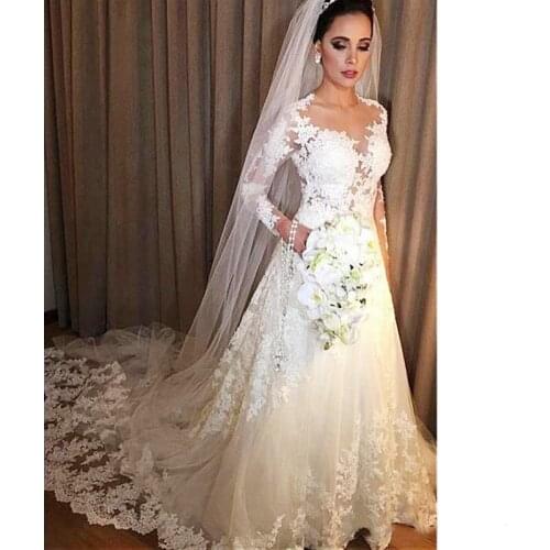 Sexy Long Sleeve Wedding Dresses 2019 New Jewel Neck Sweep Strain Lace Applique Illusion Formal Wedding Gowns Bridal Dress