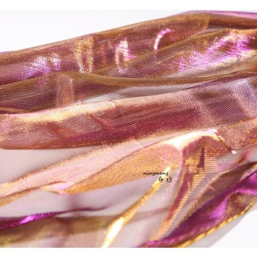 Saudi Arabias dazzling golden gauze imported perspective laser clothing cloth dress designers fancy fabric