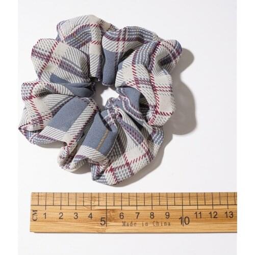 The new retro plaid large intestine hair ring for girls is sweet and versatile