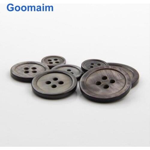 100pcs fashion natural color black shell buttons for jeans sewing 4 holes mens wear buttons for knitwear children clothes