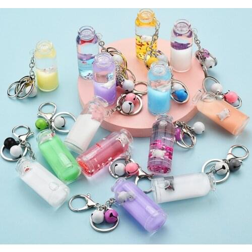 BUDROVKY Dinosaur Floating Milk Pig Keychain Pig Floating Bottle Wishing Bottle Chain Ornaments oil Bag Pendants llavero Wholesa