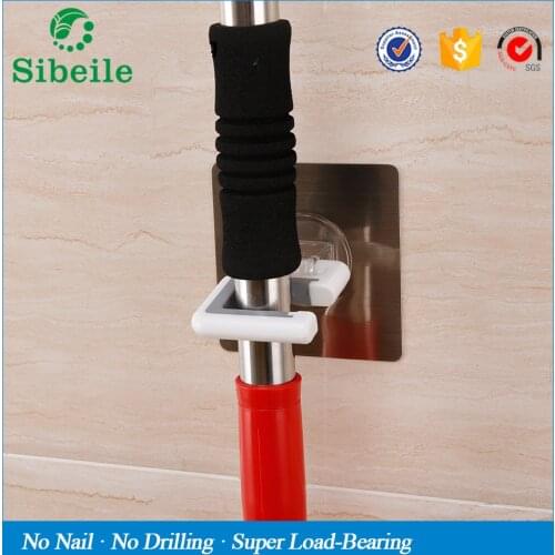 SBLE Wall mounted broom holder kitchen bathroom wall mop holder magic sticker max loading 5kg broom mop rack Hanger Holder