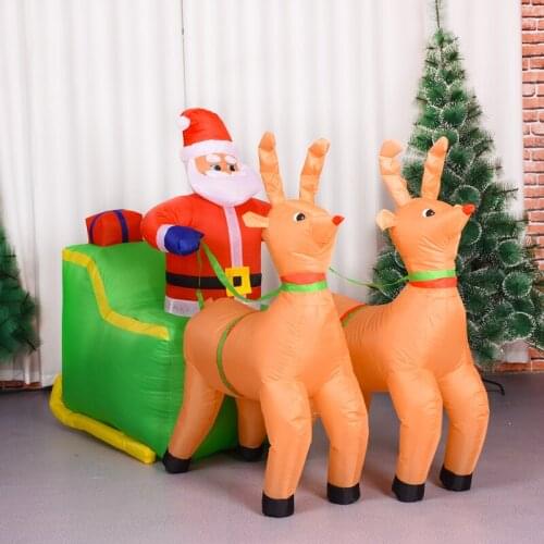 Santa Claus Is Sitting on A Sleigh and Holding An Elk Inflatable Doll. Christmas Garden Decoration Inflatable Inflatable Model