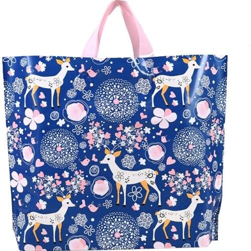 50PCS / LOT Large Shopping Packaging Plastic Gift Bags With Handle Shopping Clothing Bag Three Sizes Party Supplies