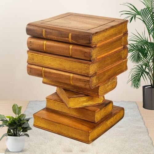 Thailand wood crafts southeast Asia carved wooden stool modelling of ancient books in the low stool bench a few shoes