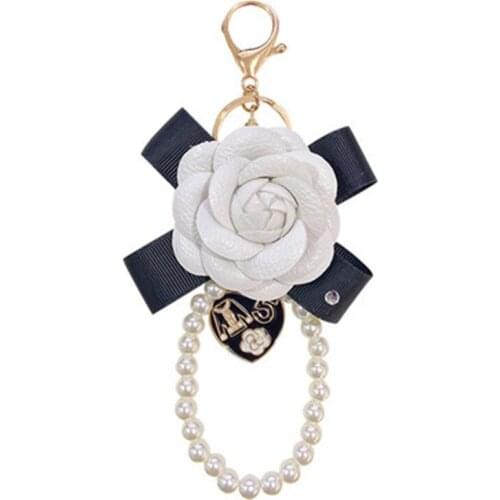 Luxury Jewelry Pearl Camellia Keychain Pearl Pendant Bag Decoration Pearl Chain Camellia Keychains For Woman