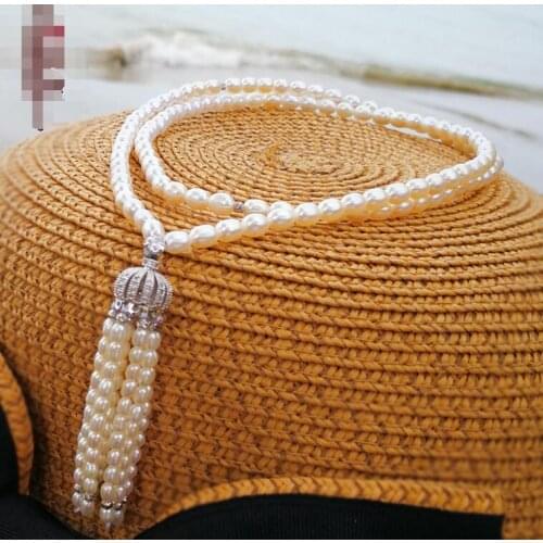 Natural freshwater 8-10mm Rice type pearl white sweater chain ladies new necklace 50inch