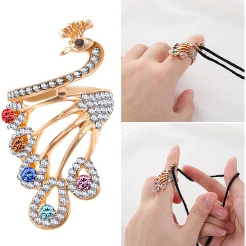 HOT 1PC Peacock Shape Knitting Loop Crochet Loop Ring Finger Wear Thimble Yarn Guides Sewing Knitting Accessories