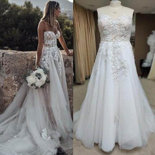 Strapless Beading Luxury Princess Wedding Gowns Custom Made Sweep Train Zipper Beach Sweetheart Appliqued Tulle Bridal Gowns