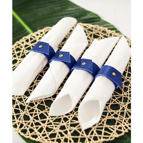 Leather Napkin Ring Set dark blue coloured 4 piece handmade tableware accessories for interior or exterior use