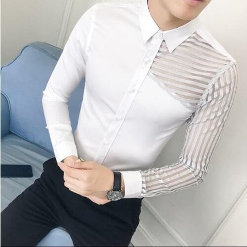 Personality stitching hollow shirt mens long-sleeved hair stylist trend handsome bar KTV nightclub singer sexy shirt tide