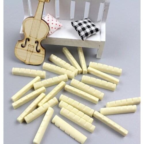 IRIN 4pcs/lot Musical Instruments Bone Nut Electric Guitar Bone Nut Saddle Guitar White Black Guitar String Pillow Accessories