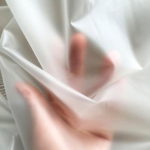 New translucent misty Tpu fabric see-through plastic clothing fashion raincoat waterproof sewing Diy designer fabric wholesale
