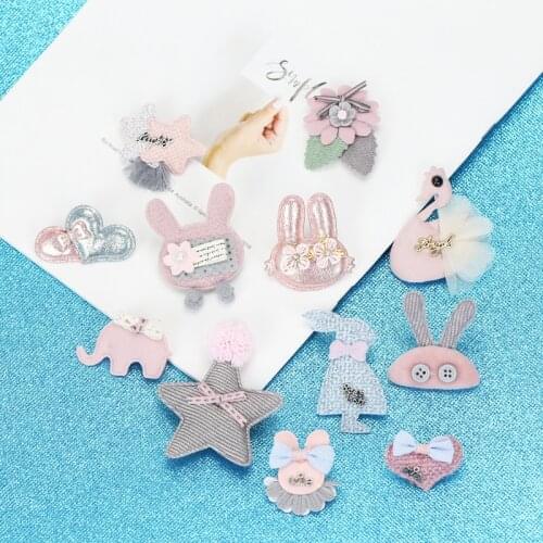 Hand-knitted fabric, cartoon animals, personalized badge pins used to decorate the skirts of little girls’ clothes