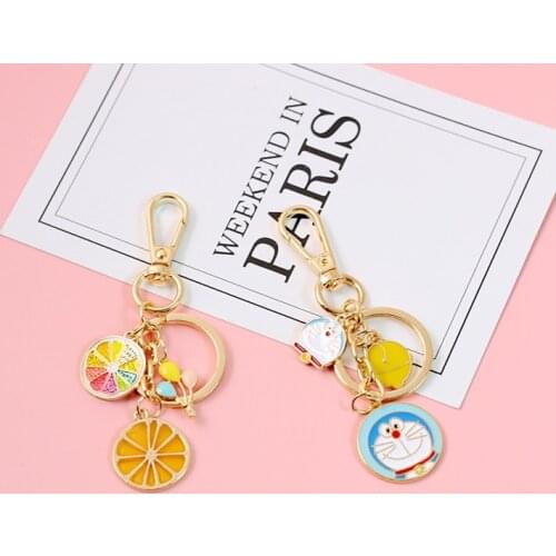 Cute Anime Cartoon Doraemon Bear Kitty Lemon Summer Keychain Metal Key Chains Car Bag Pendent Charm Women Accessories D603
