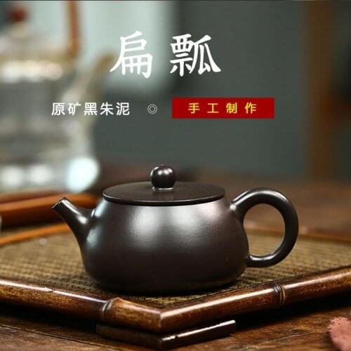 Recommended yixing boutique wholesale handmade black zhu debris ladle home of kung fu tea set undertakes the teapot