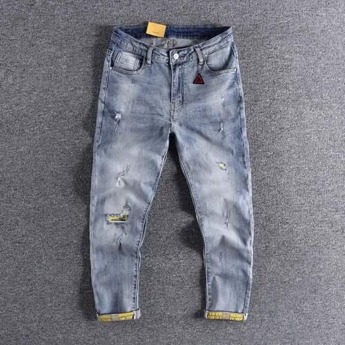 2020 Light nine point jeans mens slim elastic pants European and American mens fashion brand beggars hole youth trouser 0312