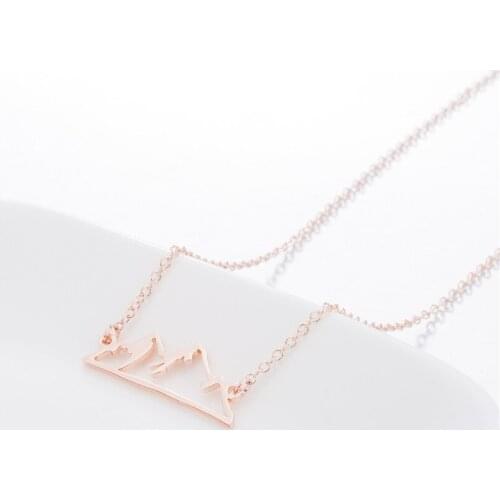 European and American popular personality hollow snow mountain necklace simple cross-border jewelry