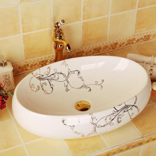 Bathroom Cloakroom Ceramic Counter Top Wash Basin Bathroom Sinks washing basin for hotel oval white