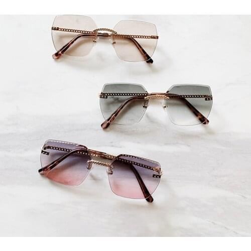 New fashion rimless sunglasses uniquely designed women’s glasses rimless trimming large square-shaped chain sunglasses