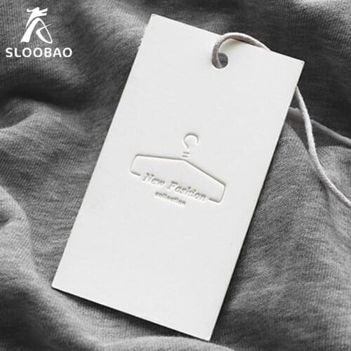 Free shipping tag customized special paper embossed logo tag design