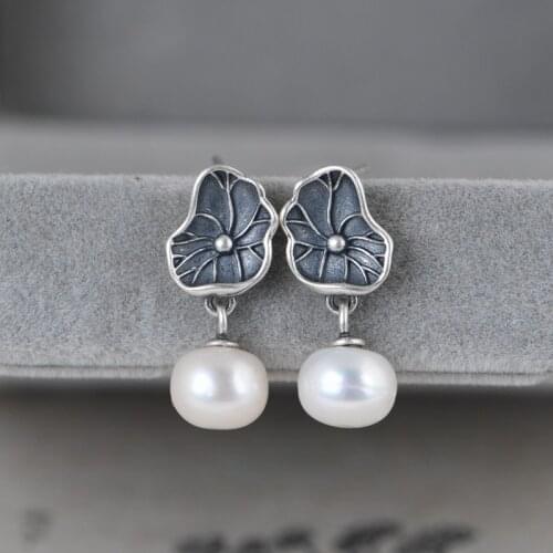 LANGYAN Stud Earrings