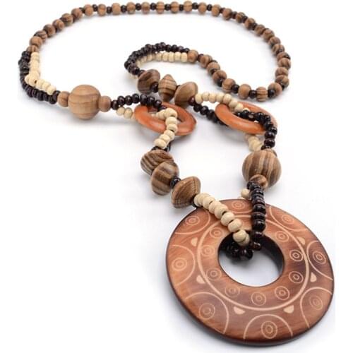 Magic Sun lines Hand Carved Exotic Hollow Round Woody Beaded Pendant Necklace Fashion Jewelry for Women Birthday Gift Present