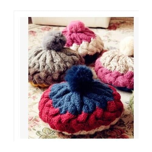 Free shipping Rabbit hair knitted cap New winter thick twist three color round big rabbit fur ball hitting scene lady hat