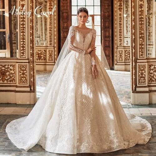 Ashley Carol Lace Ball Gown Wedding Dress 2021 Long Sleeve Backless Princess Bride Beading Appliques Scoop Vintage Bridal Gowns