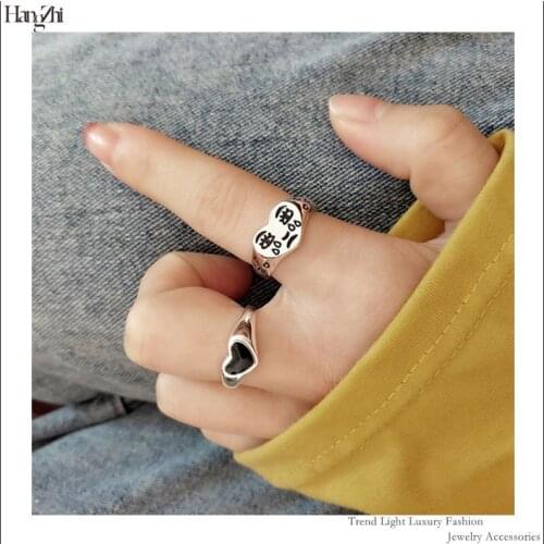 Korea Spring Retro Simple Style Black Teardrop Flowers Men and Women Love Opening Jewelry Jump Di Hollow Spirit Ring 2021