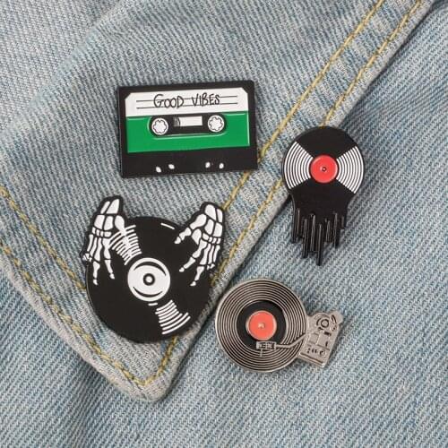 Music player tape disc hand skeleton hand dish disc music personality brooch suitable for musician clothes badge jewelry gift