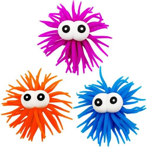 The New Funny Protruding Eyes Sea Urchin Strange Glowing Pull Vent Ball Pull Hairy Ball Spoof Toy Ornaments
