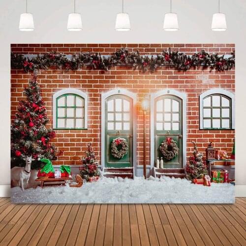 Christmas Photography Backdrop for Party Snow Retro Door Brick House Winter Xmas Background Christmas Trees Wreath Window