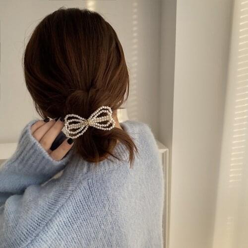 2021 spring new super fairy temperament pearl bow spring clip Korean version of the back of the head headdress hair clip