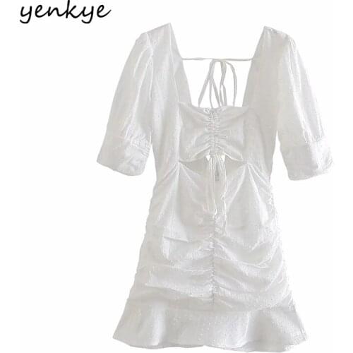 YENKYE Sexy Backless White Dress Women Waist Hollow Out Draped Bodycon Mini Dress Female Summer Vestido