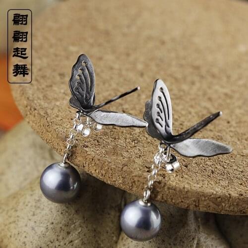 Ms character silver product S925 pure silver jewelry fashion exquisite shell pearl has stereo butterfly stud earrings