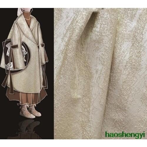 Heavy industry irregular beige gold thread three-dimensional particles jacquard texture fashion fabric / half price