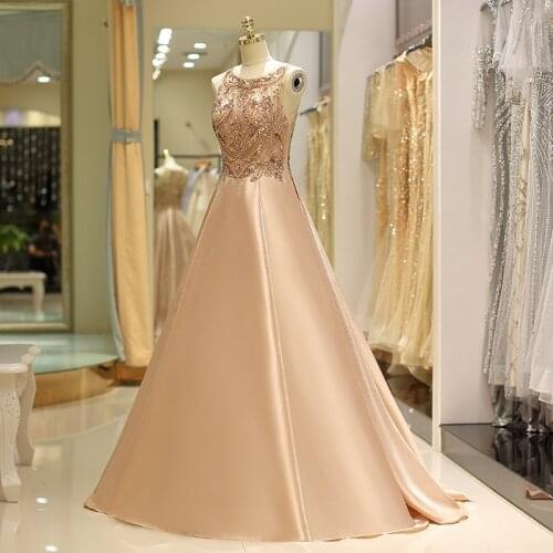 2020 Latest Arrival Dark Champagne Sparkling Beading Evening Dresses Long Sleeveless Wedding Guest Gown Jewel Neck Illusion Back