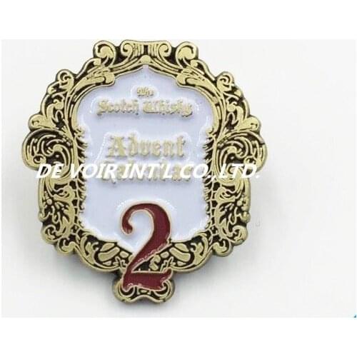 Metal badge with gold plating, pin badge with gold plating and white enamel