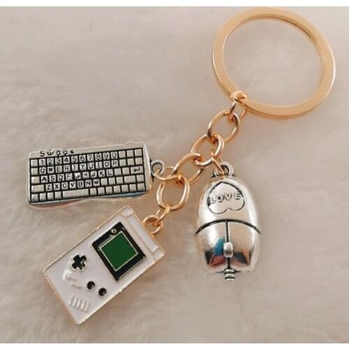 New drip alloy game console keychain game peripheral key ring fashion charm keychain wholesale