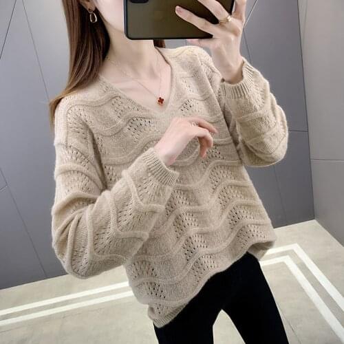 Long-sleeved v-neck hollow loose womens 2021 spring and autumn new solid color Western-style sweater all-match top