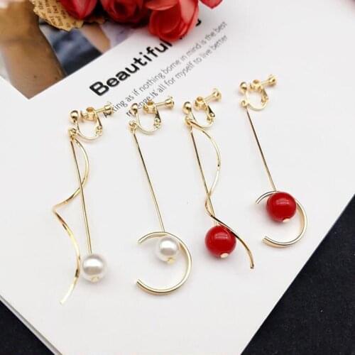 Grace Jun New Arrival Gold Color Simulated Pearl Long Bending Tassel Clip on Earrings No Pierced for Girl Charm Pierced Earrings