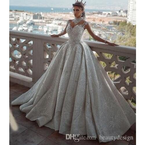 Vestidos De Noiva High Neck Luxury Arabic Wedding Dresses Capped Sleeves Open Back Sequins Floral Cathedral Bridal Gowns